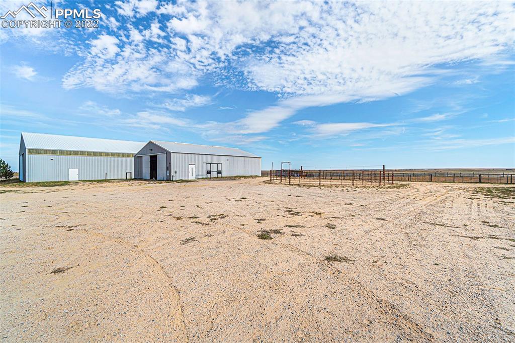 3180 Calhoun Byers Road Byers, CO 80103 - Photo 34 of 48 a view of pool and mountain in the back