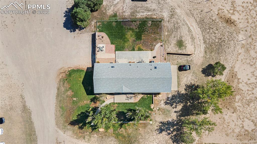3180 Calhoun Byers Road Byers, CO 80103 - Photo 37 of 48 an aerial view of a house with a yard