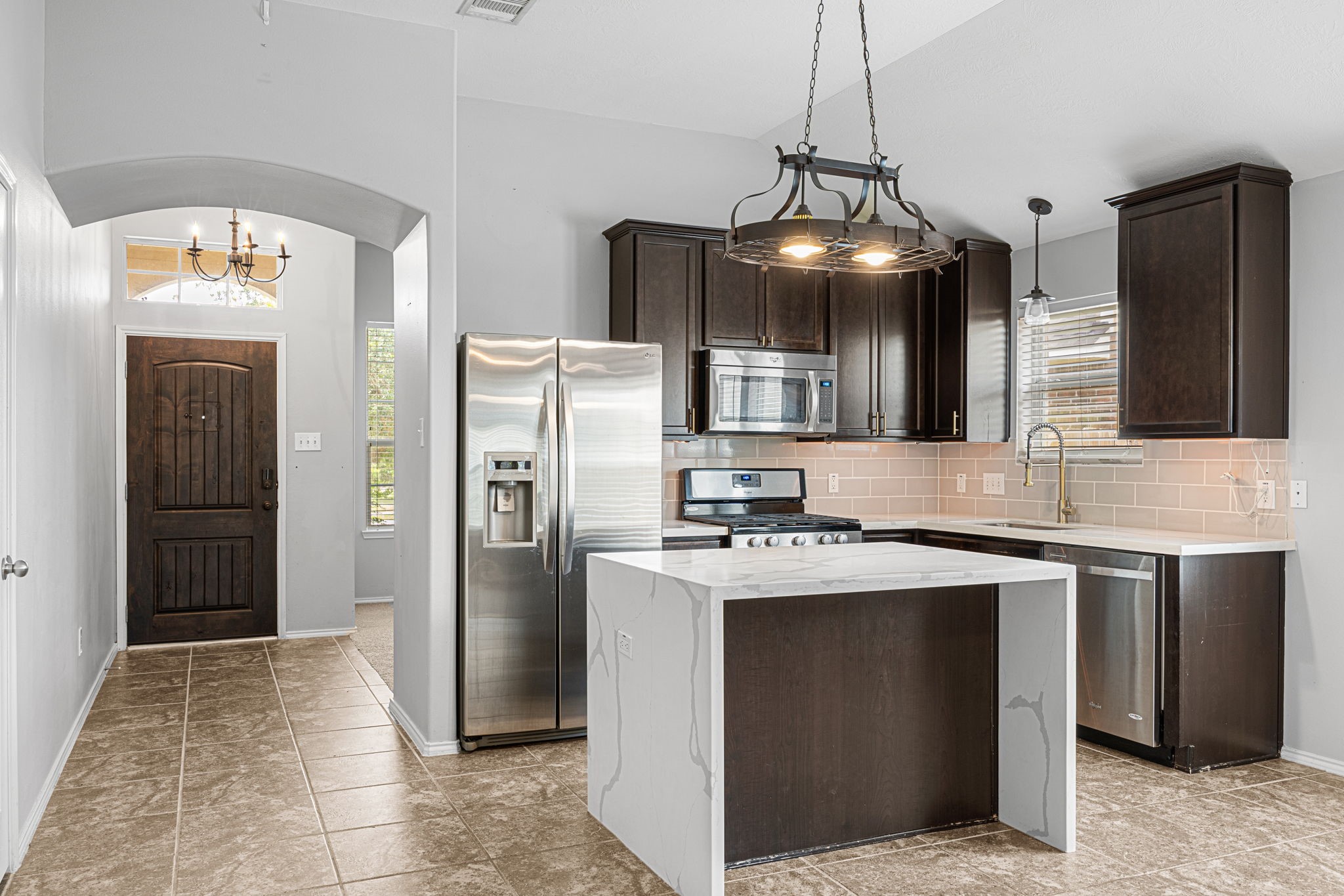 2211 Oak Rise Drive Conroe, TX 77304 - Photo 3 of 29 Open-concept kitchen and dining area