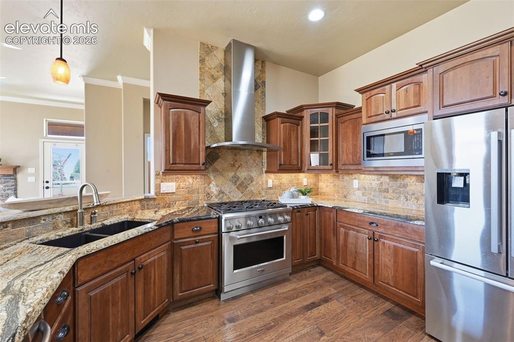 13184 Cake Bread Heights Colorado Springs, CO 80921 - Photo 14 of 47 Granite countertops and upgraded cabinets