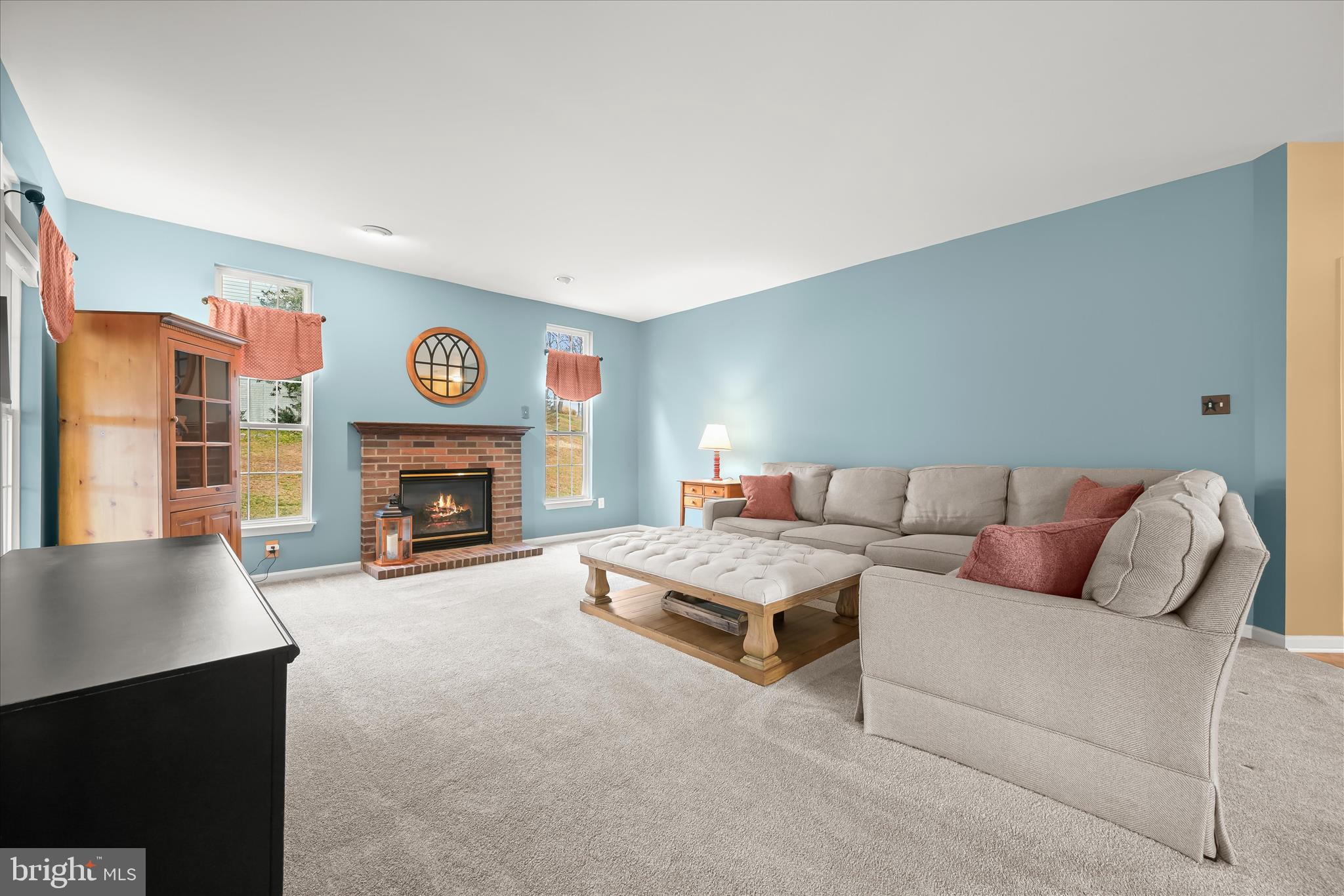 2028 Meadow Tree Court Cooksville, MD 21723 - Photo 24 of 73 a living room with furniture and a fireplace