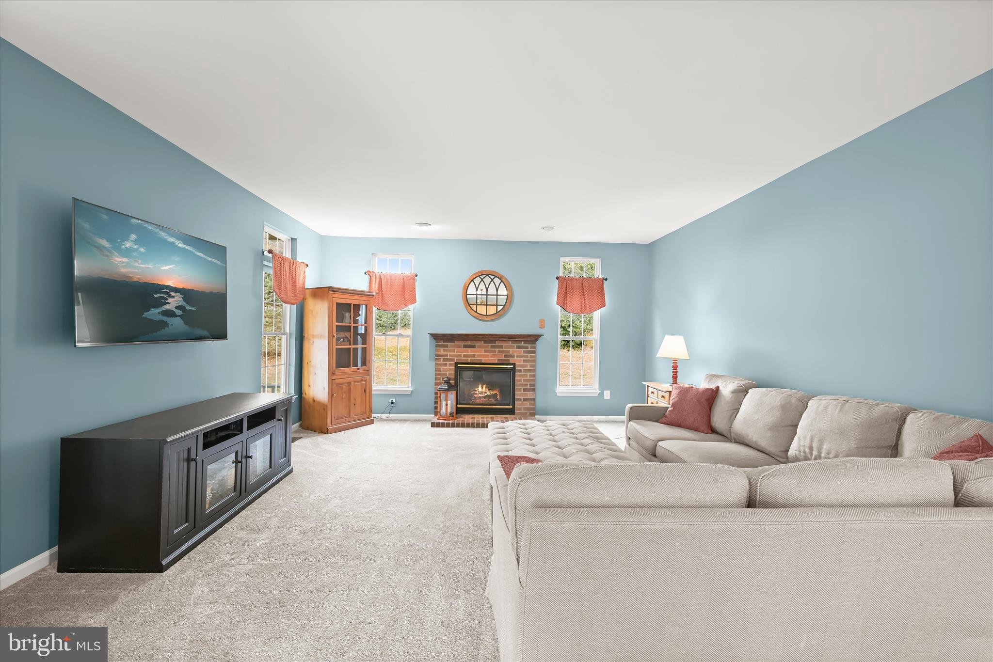 2028 Meadow Tree Court Cooksville, MD 21723 - Photo 25 of 73 a living room with furniture and a flat screen tv