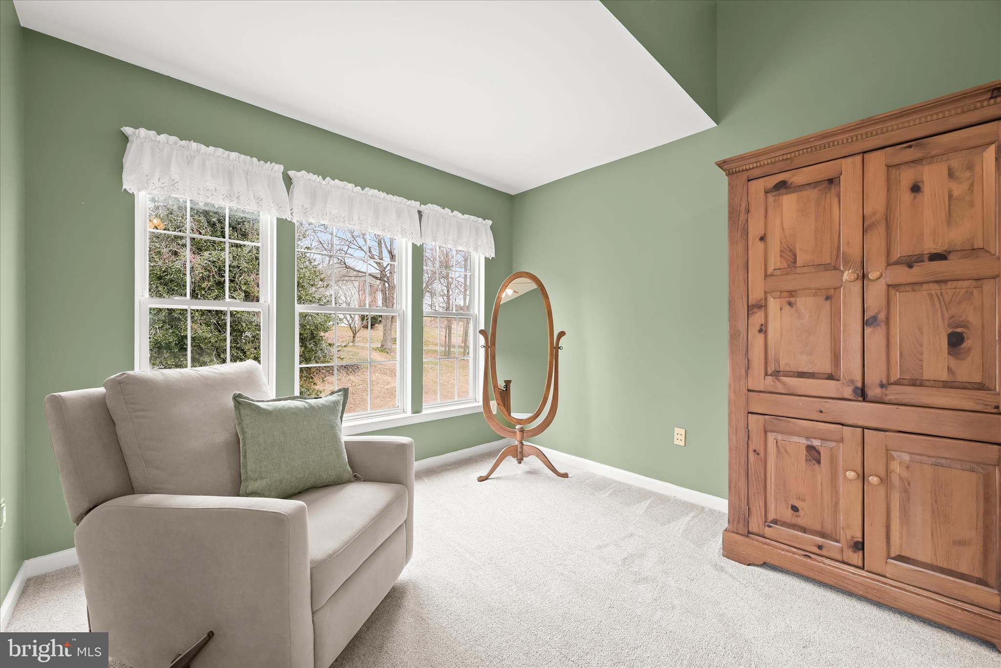 2028 Meadow Tree Court Cooksville, MD 21723 - Photo 32 of 73 a living room with furniture a large window and flat screen tv