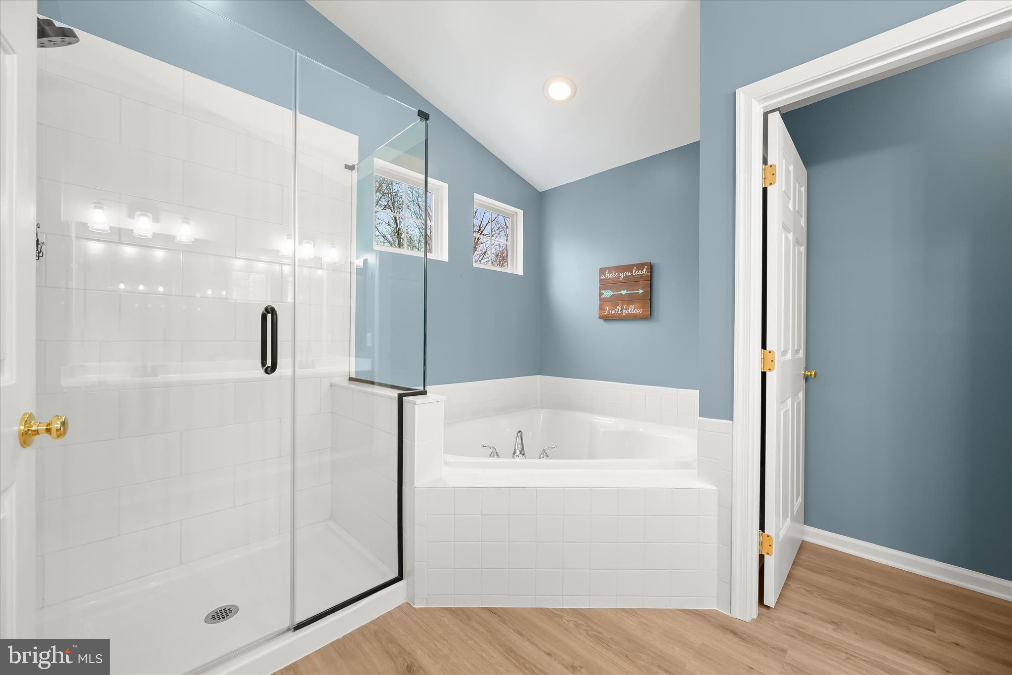 2028 Meadow Tree Court Cooksville, MD 21723 - Photo 34 of 73 a bathroom with a bathtub and a shower