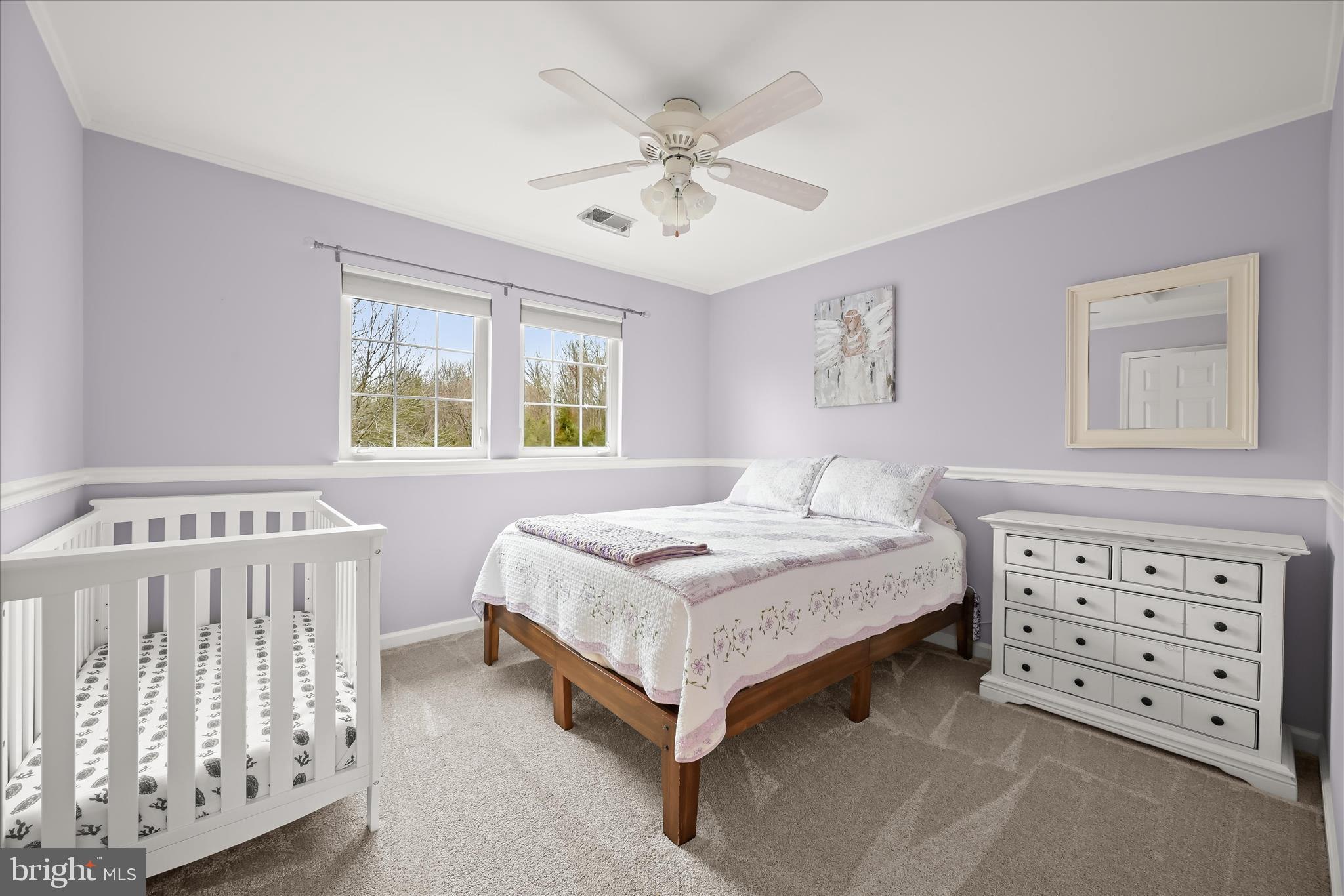 2028 Meadow Tree Court Cooksville, MD 21723 - Photo 37 of 73 a bedroom with a bed a chandelier and a dresser