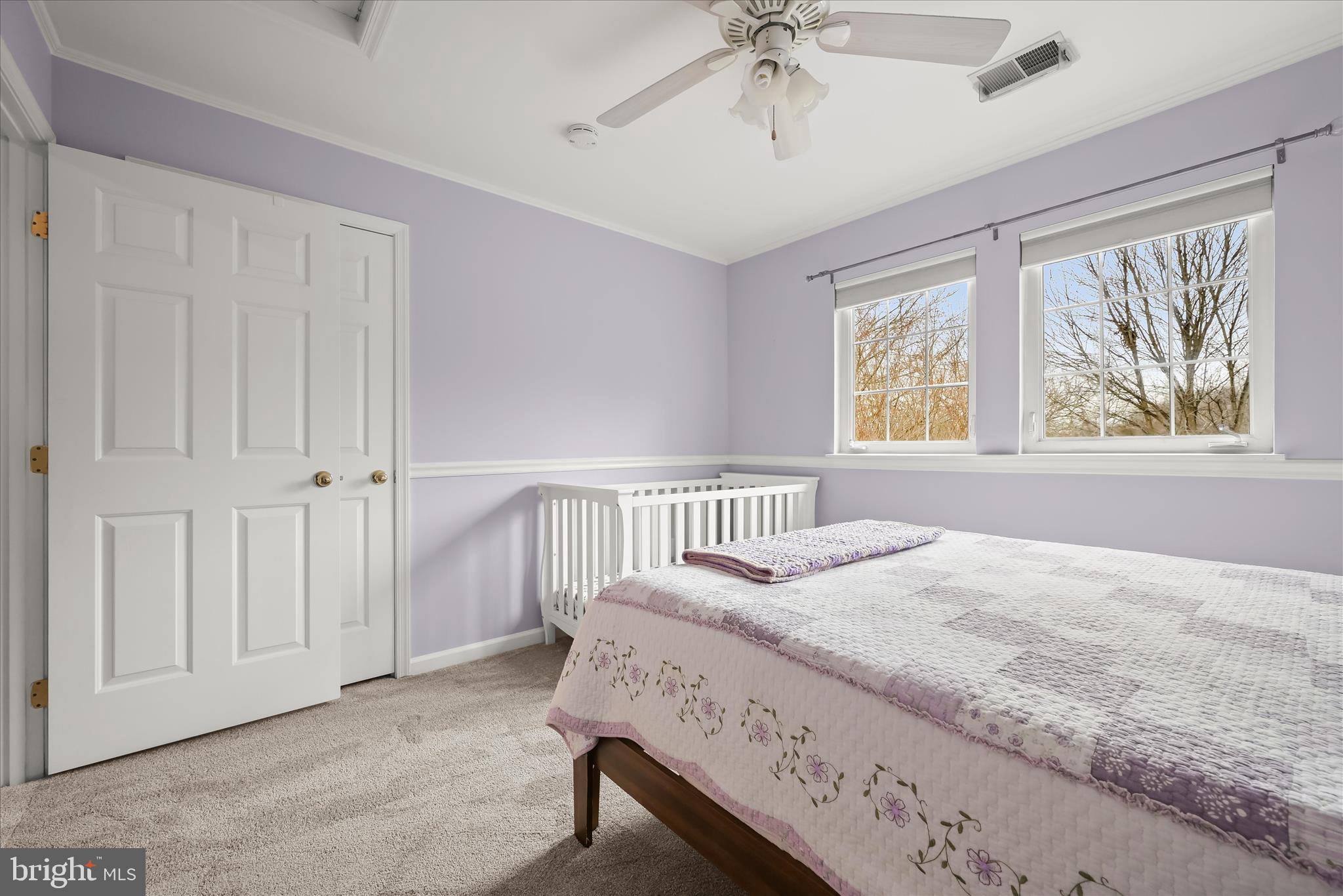 2028 Meadow Tree Court Cooksville, MD 21723 - Photo 38 of 73 a bedroom with a bed and a window