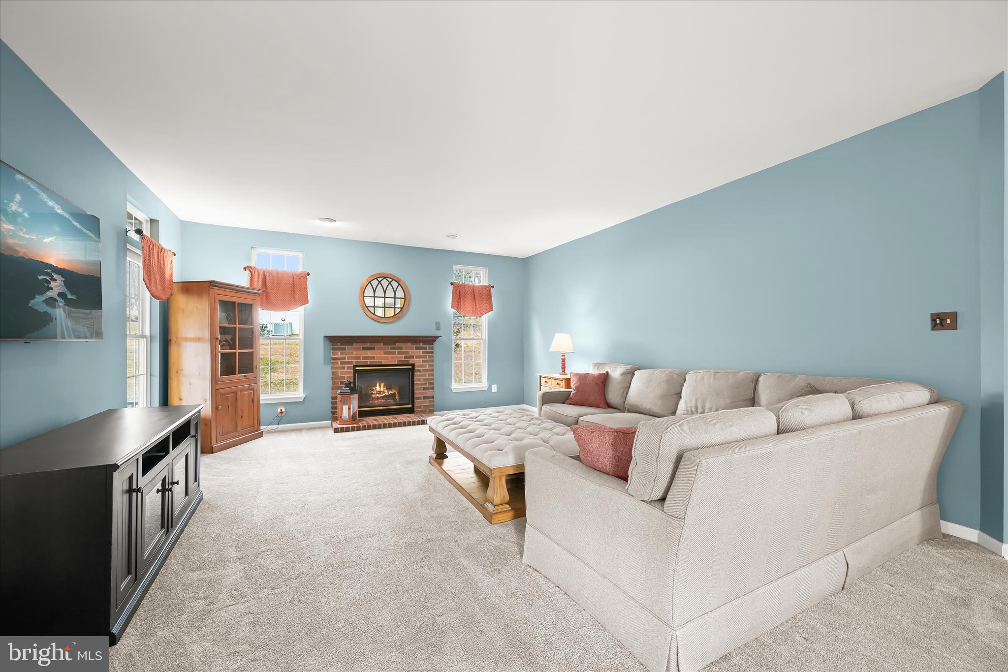 2028 Meadow Tree Court Cooksville, MD 21723 - Photo 5 of 73 a living room with furniture and a fireplace