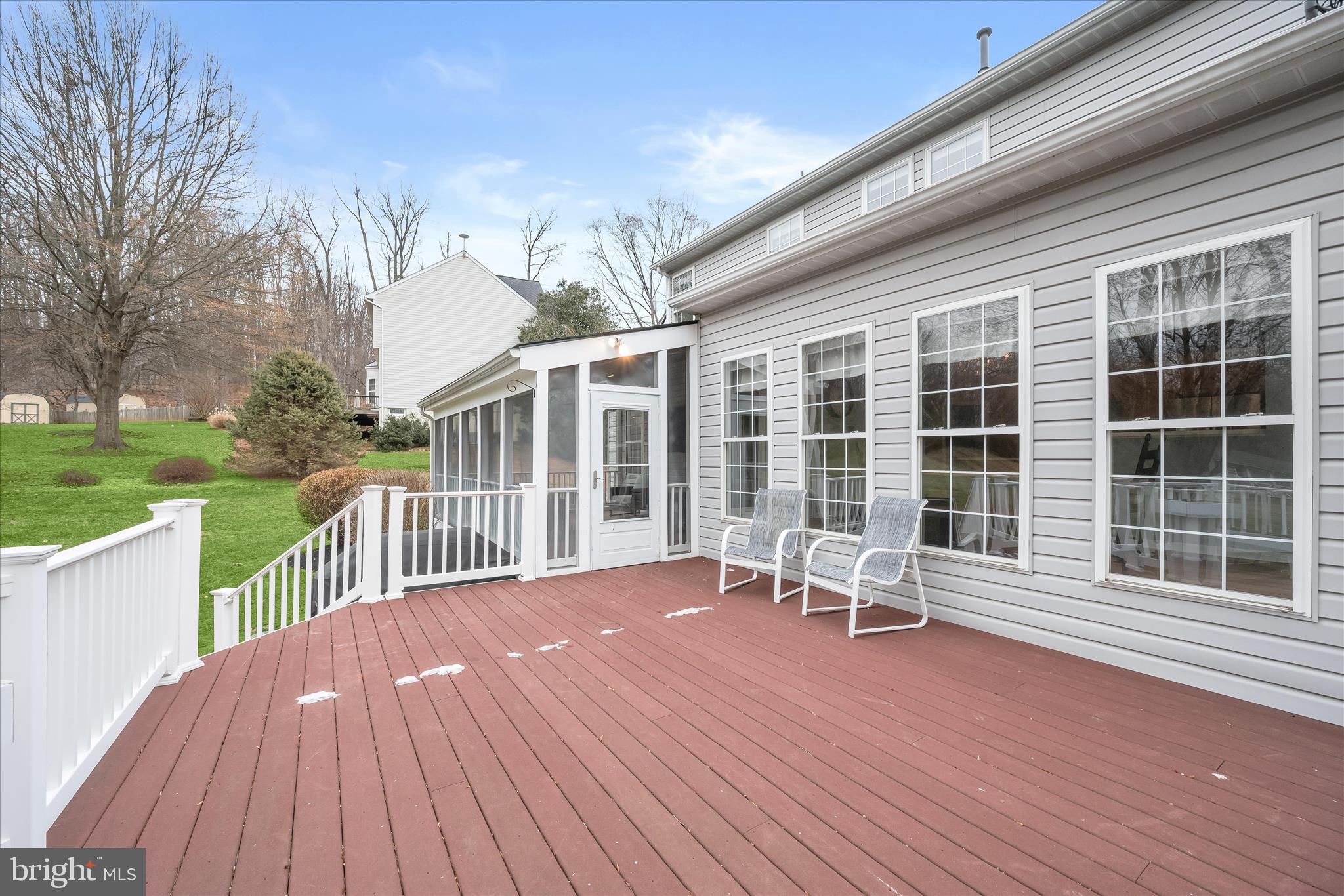 2028 Meadow Tree Court Cooksville, MD 21723 - Photo 53 of 73 a view of a deck with table and chairs and wooden floor