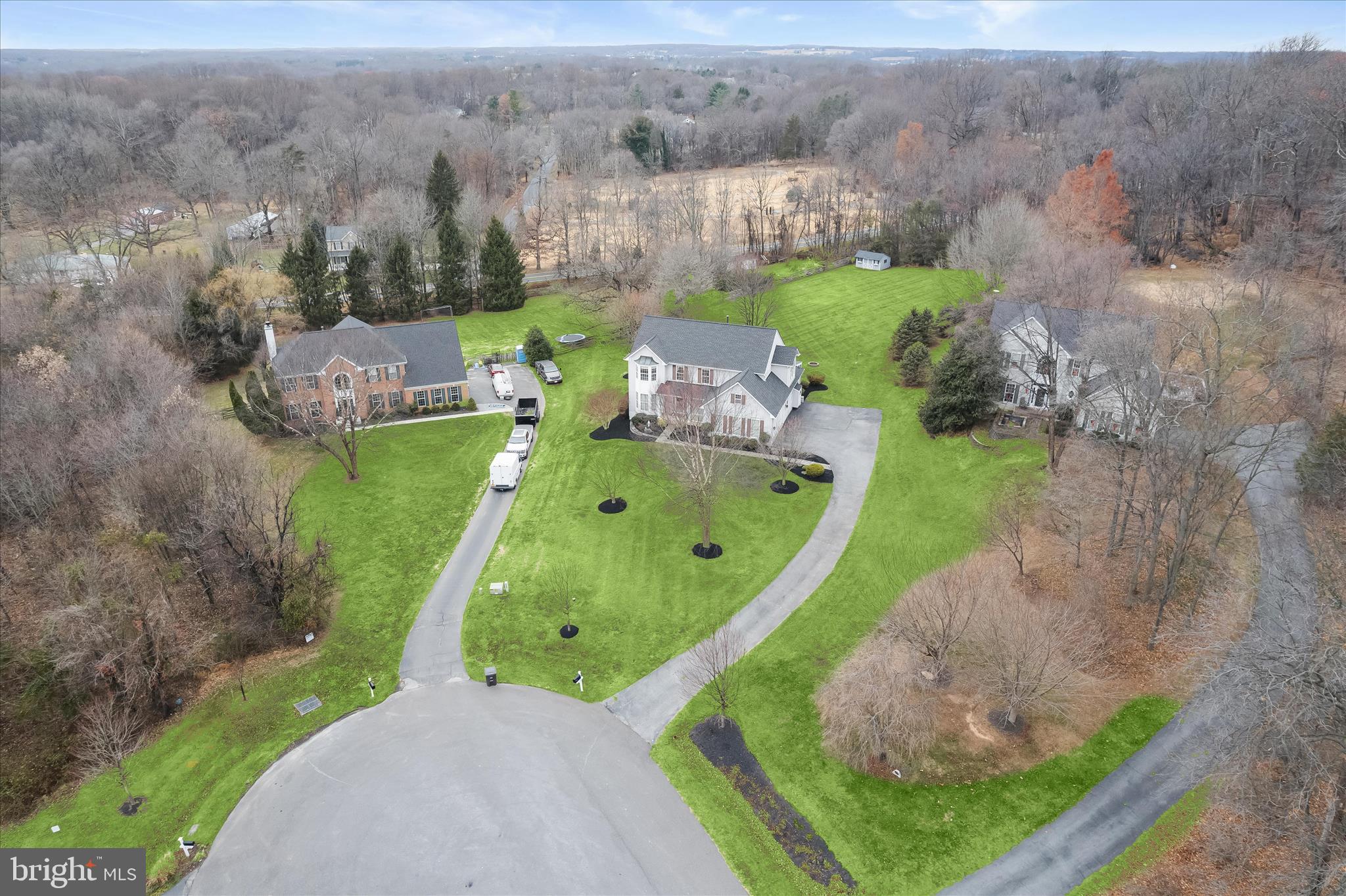 2028 Meadow Tree Court Cooksville, MD 21723 - Photo 67 of 73 an aerial view of a house with a garden and trees