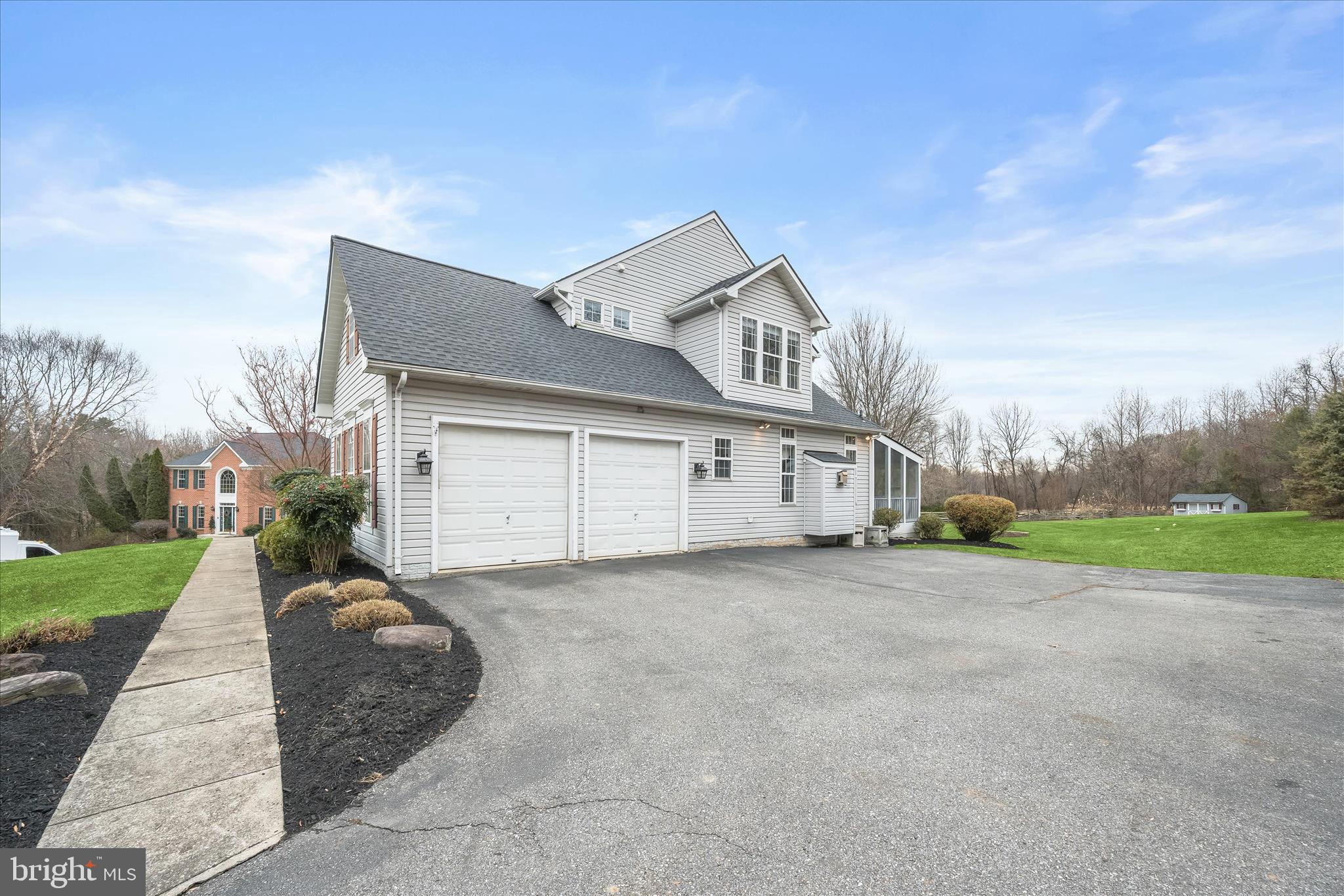 2028 Meadow Tree Court Cooksville, MD 21723 - Photo 8 of 73 2-car garage & turnaround driveway