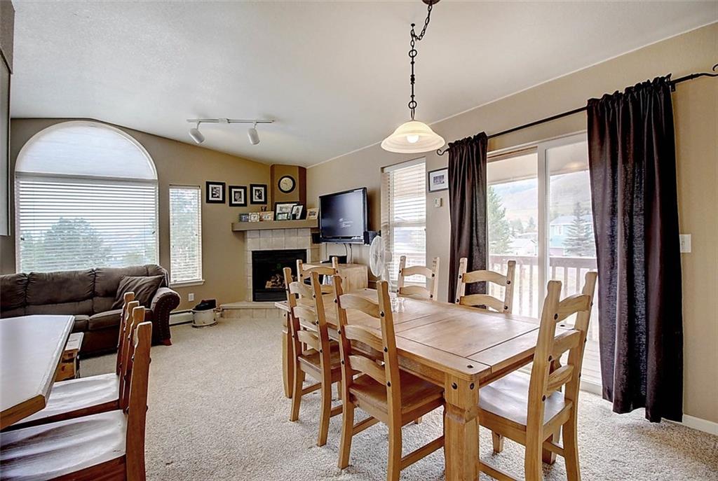 686 Alpine Road Dillon, CO 80435 - Photo 22 of 35 a dining room with furniture window and outside view