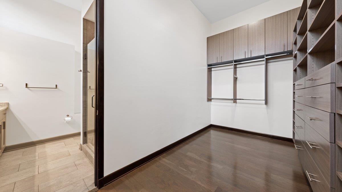 9942 Legends Drive Collierville, TN 38139 - Photo 32 of 40 an empty room with wooden floor