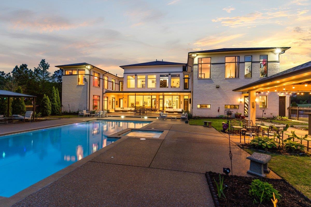 9942 Legends Drive Collierville, TN 38139 - Photo 37 of 40 a front view of a house with swimming pool having outdoor seating