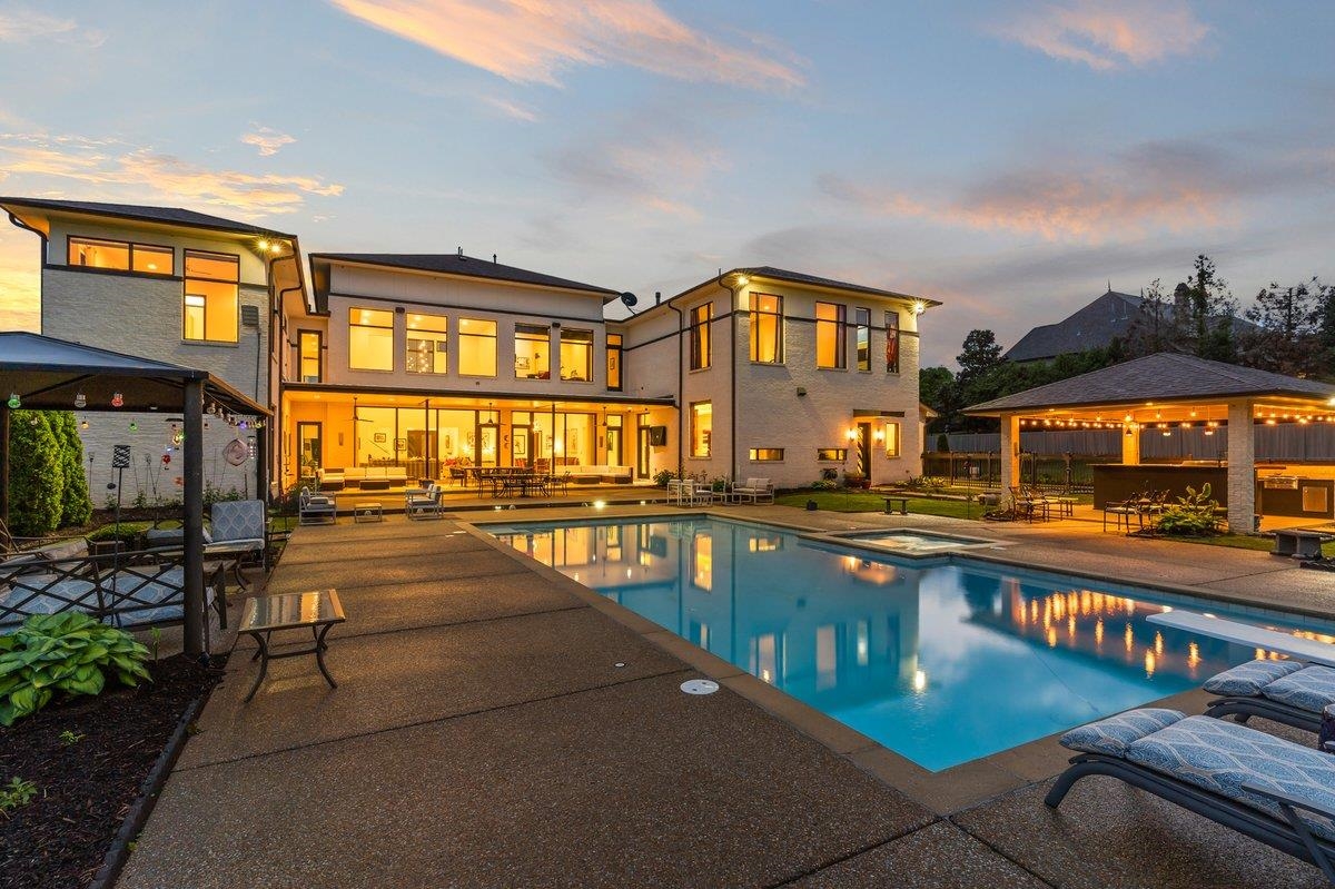 9942 Legends Drive Collierville, TN 38139 - Photo 5 of 40 a view of a swimming pool with seating space