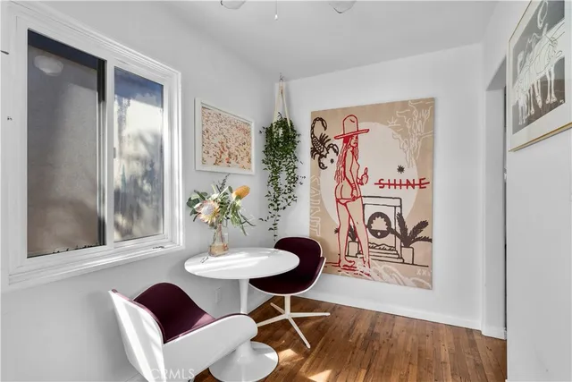 a kitchen with refrigerator a sink and cabinets