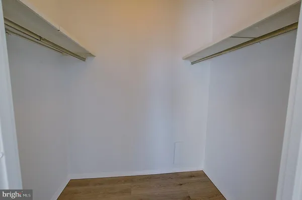 a view of small space with racks on the wall