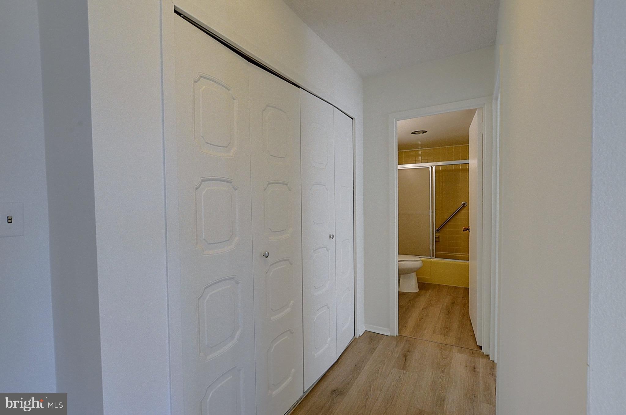 5225 Pooks Hill Road, Unit 911N Bethesda, MD 20814 - Photo 7 of 12 a view of a bathroom with a sink