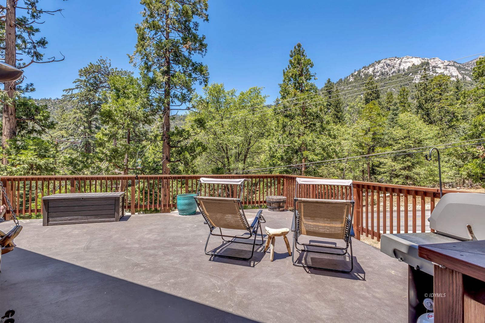 24924 Fern Valley Road Idyllwild, CA 92549 - Photo 26 of 72 a view of a chairs and table on the roof deck