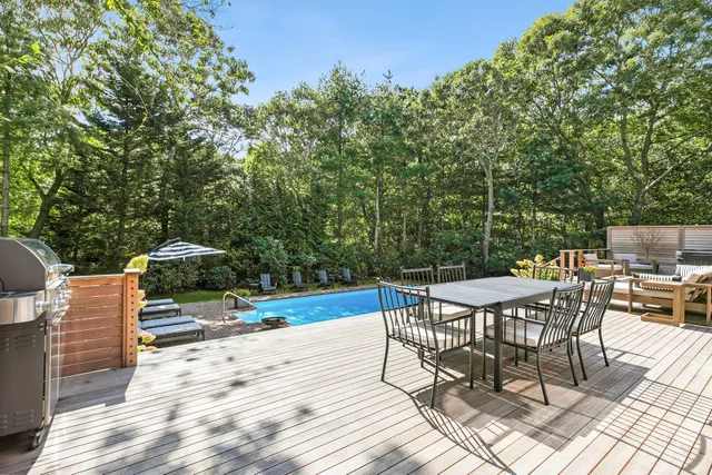 a view of a chairs and table on the wooden floor