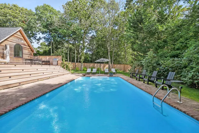 a view of a house with swimming pool