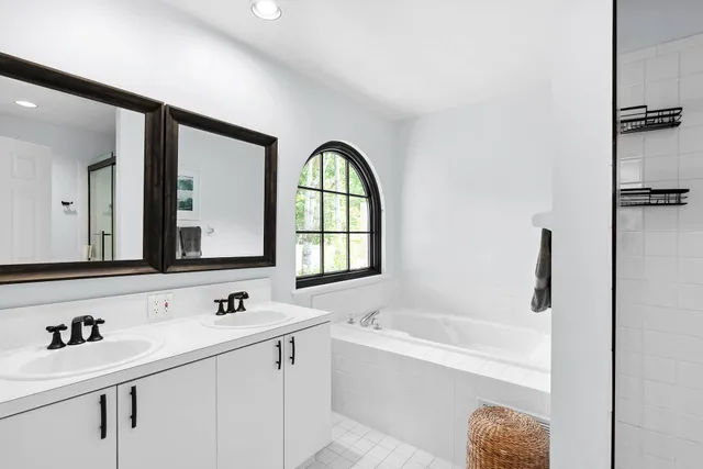 a bathroom with a sink and a bathtub