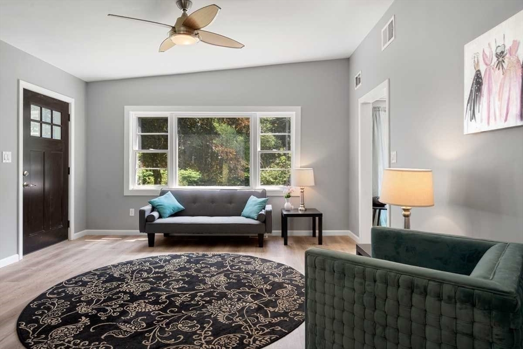 166 Packardville Road Pelham, MA 01002 - Photo 14 of 34 a living room with furniture and a couch