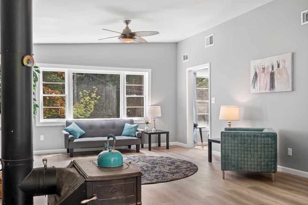 166 Packardville Road Pelham, MA 01002 - Photo 16 of 34 a living room with furniture and a window