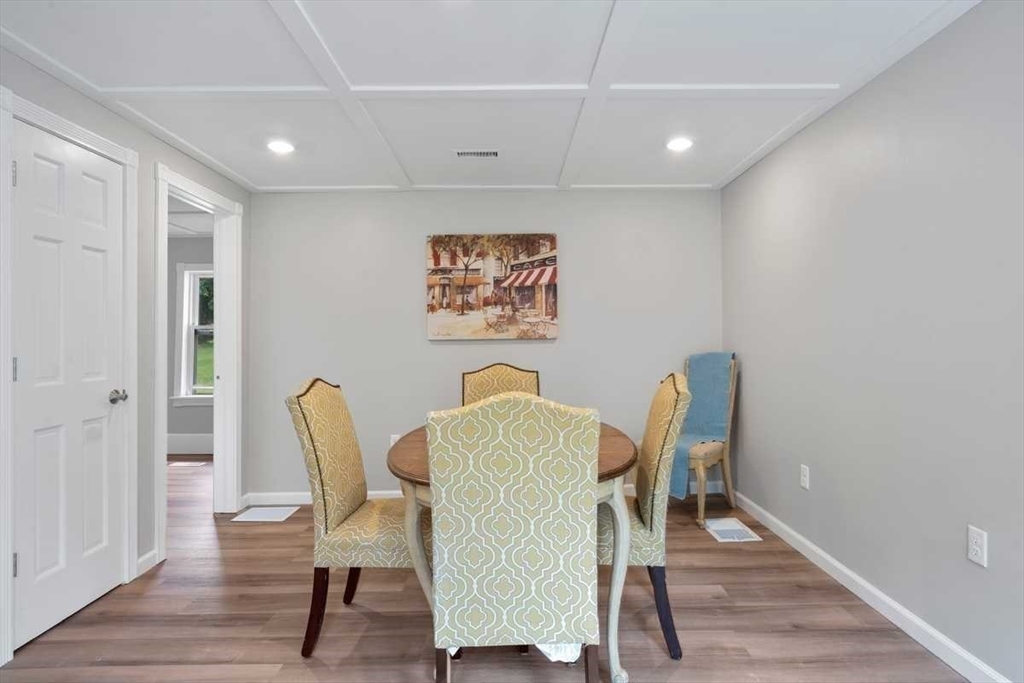 166 Packardville Road Pelham, MA 01002 - Photo 18 of 34 a view of a dining room with furniture and wooden floor