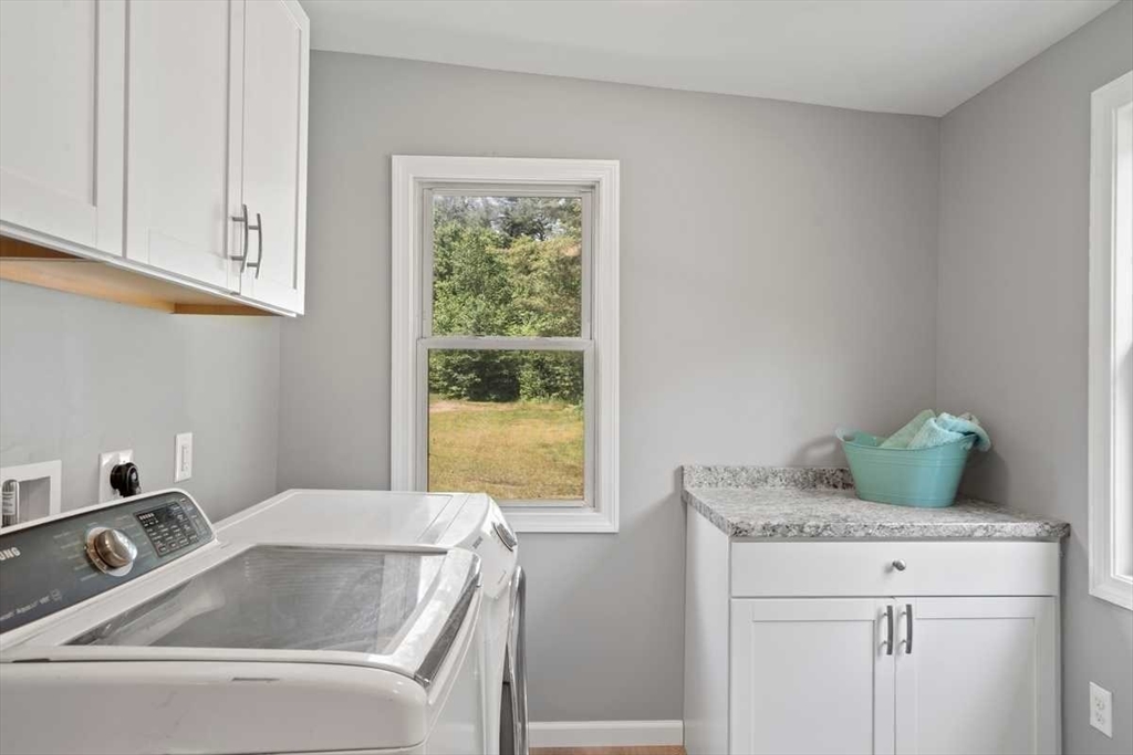 166 Packardville Road Pelham, MA 01002 - Photo 28 of 34 a bathroom with a granite countertop sink and a vanity