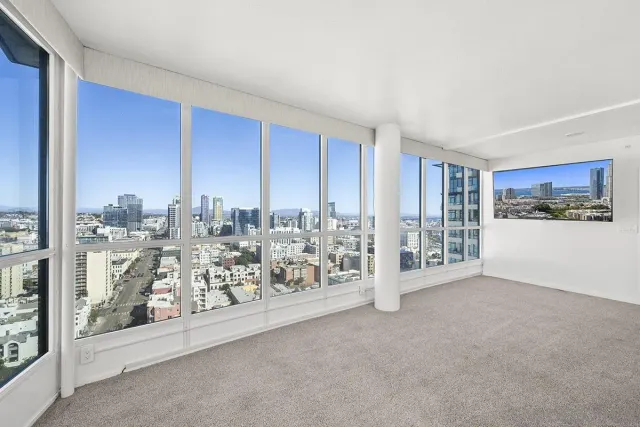 a view of swimming pool with outdoor seating and plants