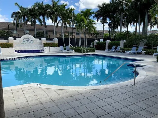 a view of outdoor space with swimming pool