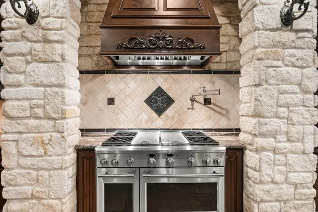 a view of a dining room with furniture and window