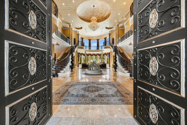 a view of a hallway with seating area