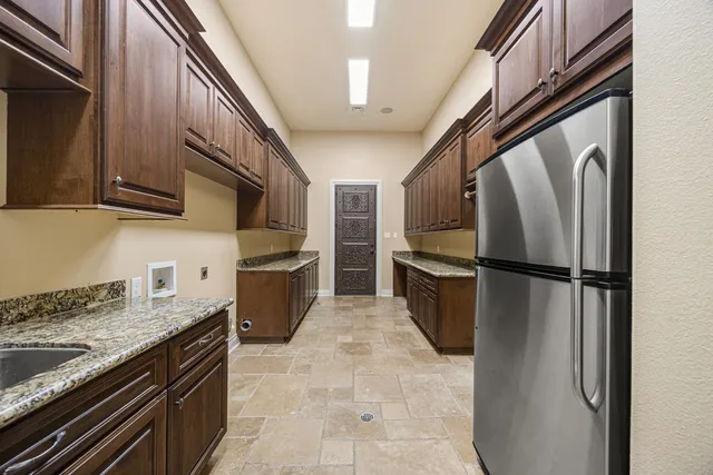 a view of a swimming pool with a yard