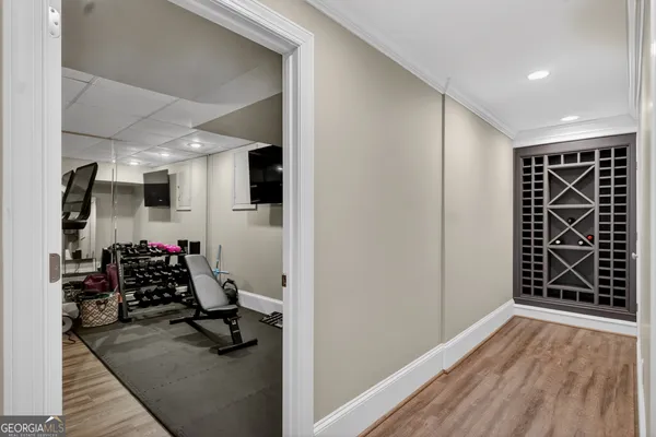 a kitchen with stainless steel appliances granite countertop a sink a stove and cabinets