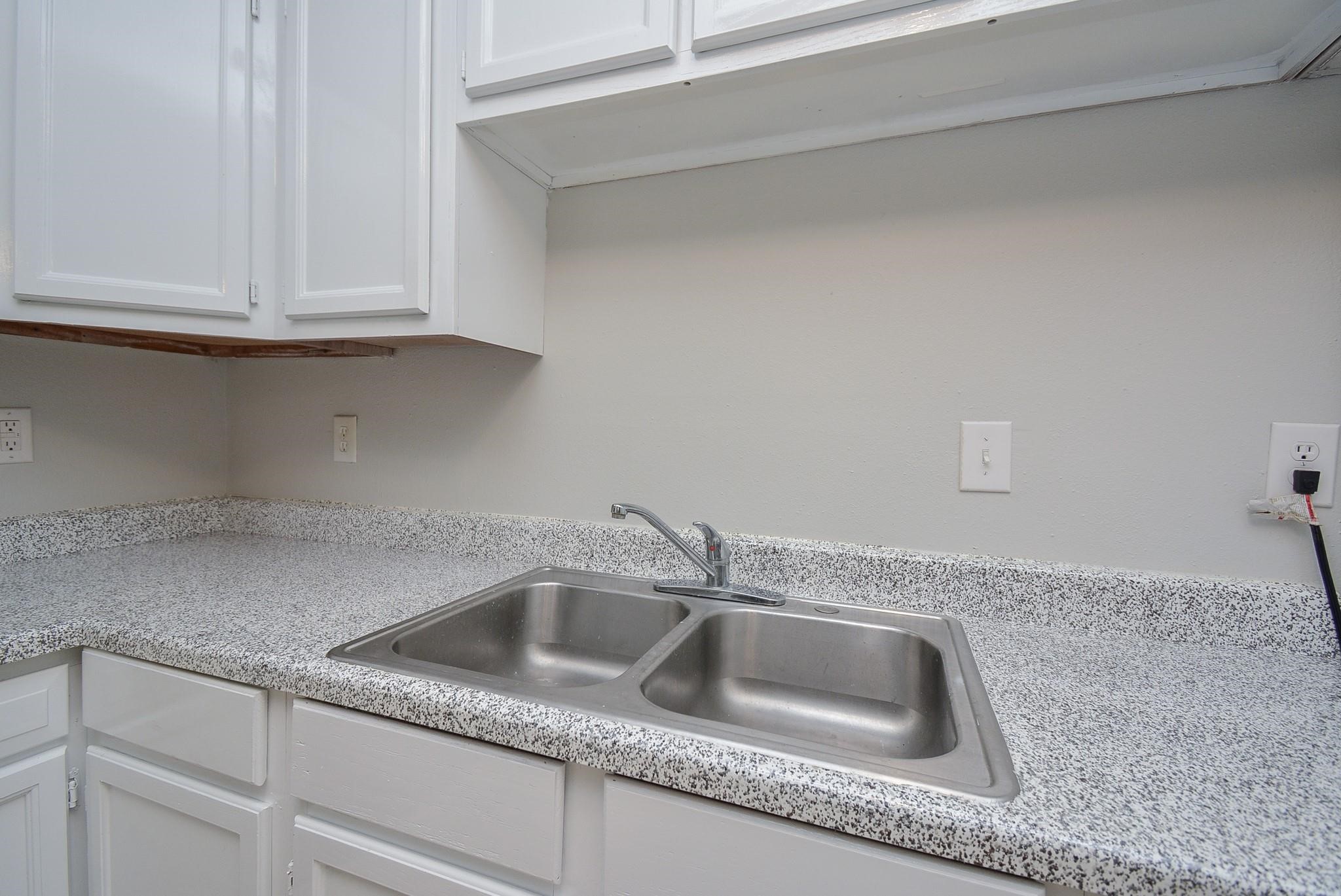 2117 Thonig Road, Unit B Houston, TX 77055 - Photo 12 of 25 a close view of sink and tap