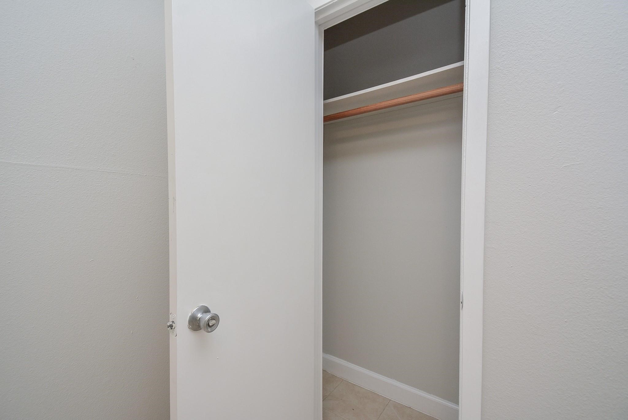 2117 Thonig Road, Unit B Houston, TX 77055 - Photo 21 of 25 a bathroom with a glass shower door