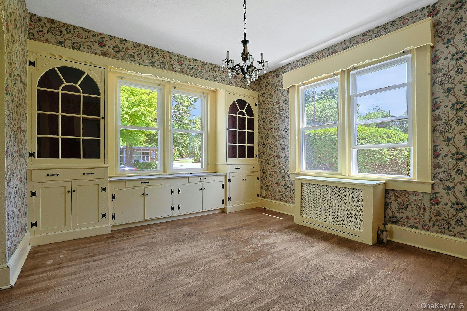 333 South Middletown Road Nanuet, NY 10954 - Photo 11 of 22 an empty room with windows and chandelier