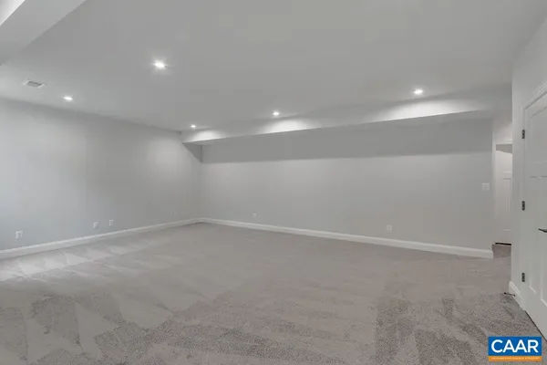 a view of a room that has a window in it