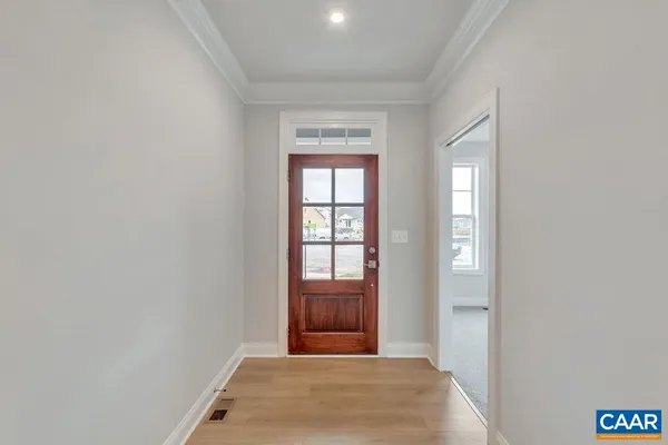 a view of hallway with windows