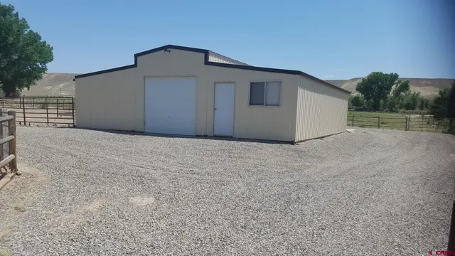 a view of an empty room with a yard