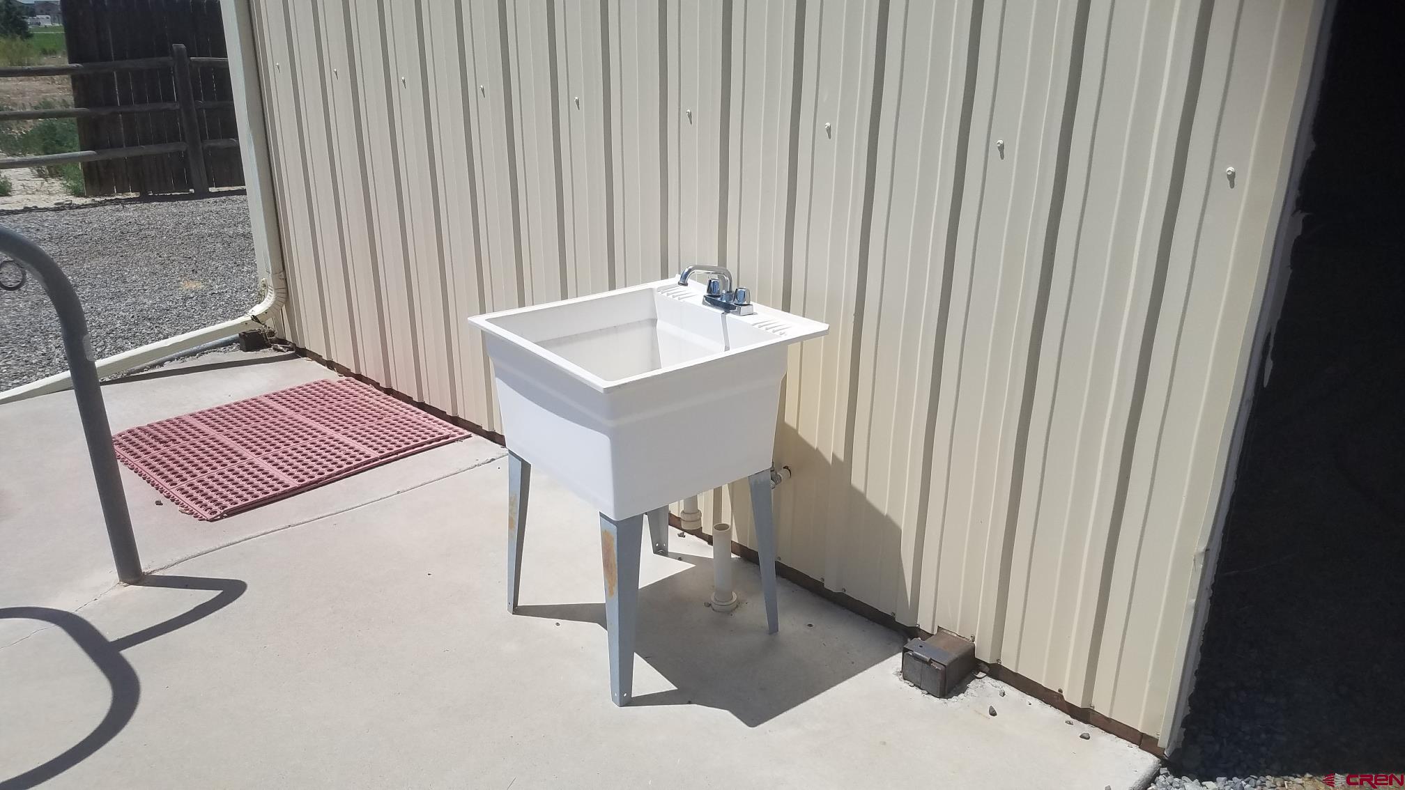 7095 Buena Vista Road Delta, CO 81416 - Photo 29 of 33 a bathroom with a sink and a mirror