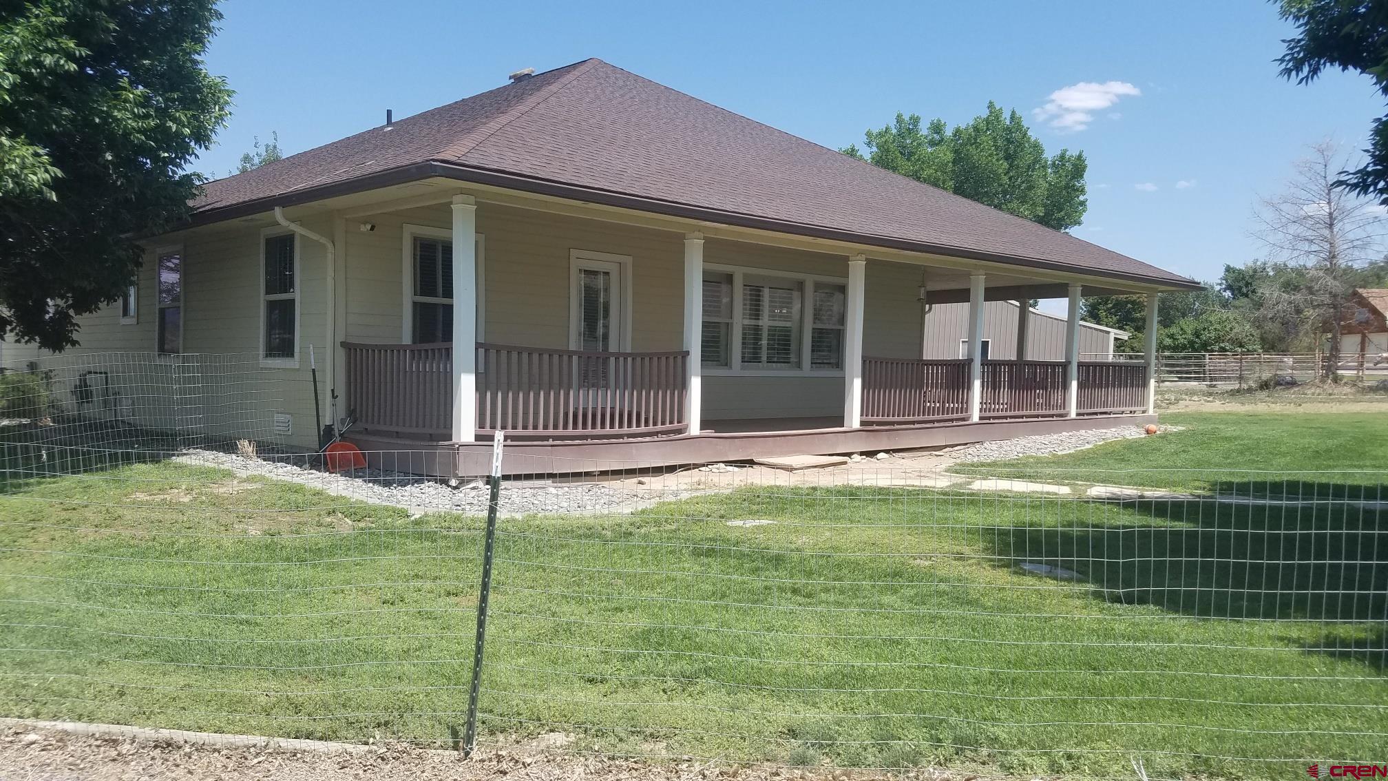 7095 Buena Vista Road Delta, CO 81416 - Photo 3 of 33 a house view with a garden space