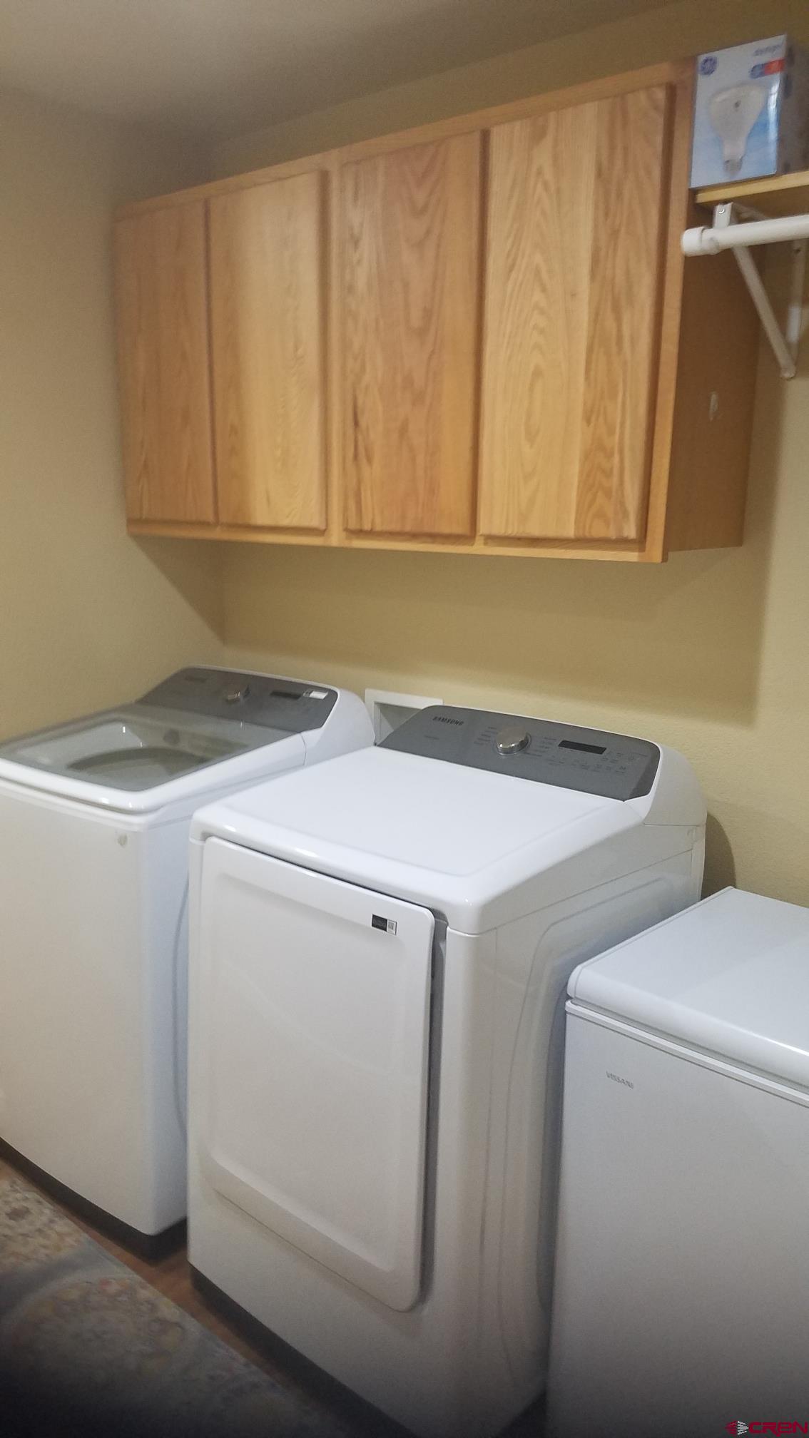 7095 Buena Vista Road Delta, CO 81416 - Photo 32 of 33 a utility room with dryer and washer