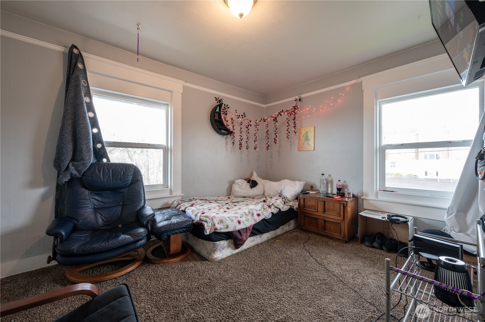 300 West 3rd Street Aberdeen, WA 98520 - Photo 15 of 28 a bedroom with furniture and a window