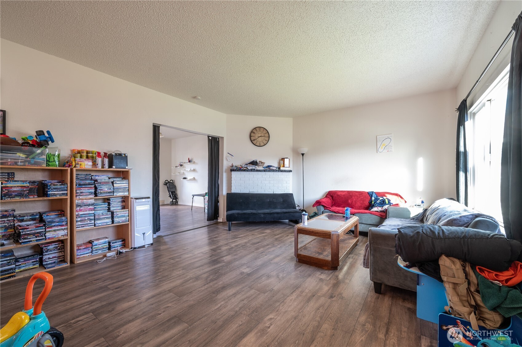 300 West 3rd Street Aberdeen, WA 98520 - Photo 19 of 28 a living room with furniture and wooden floor