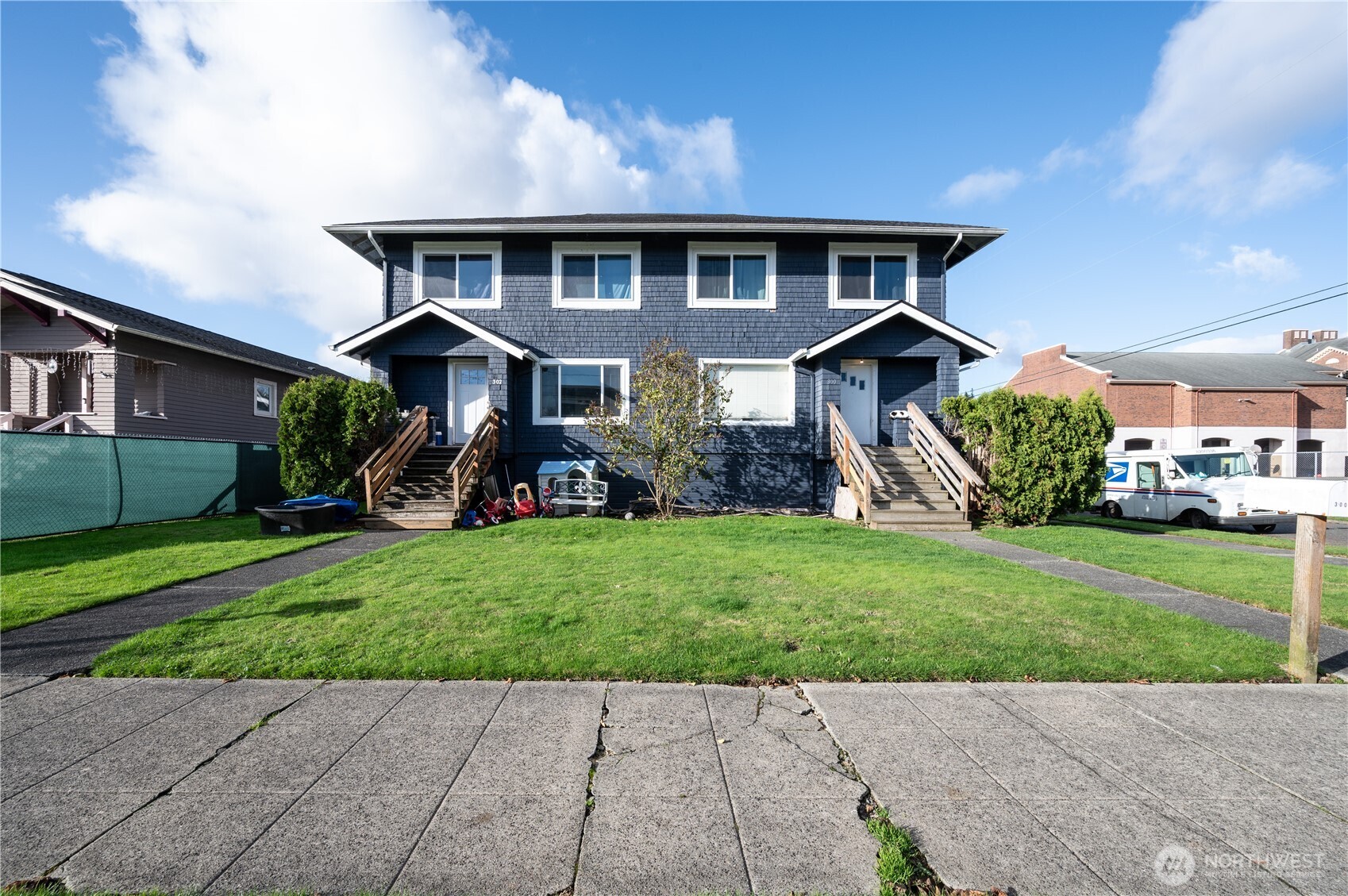 300 West 3rd Street Aberdeen, WA 98520 - Photo 26 of 28 a front view of a house with garden