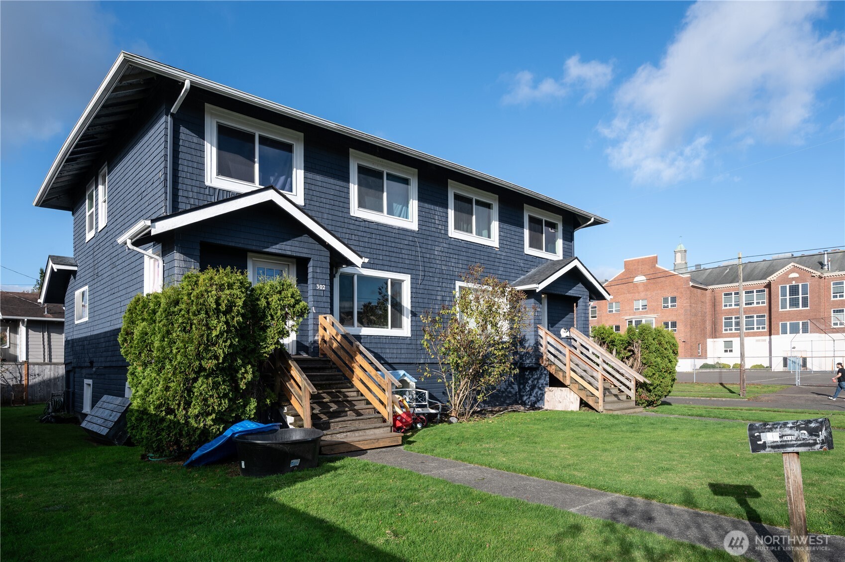 300 West 3rd Street Aberdeen, WA 98520 - Photo 28 of 28 a front view of a house with a yard