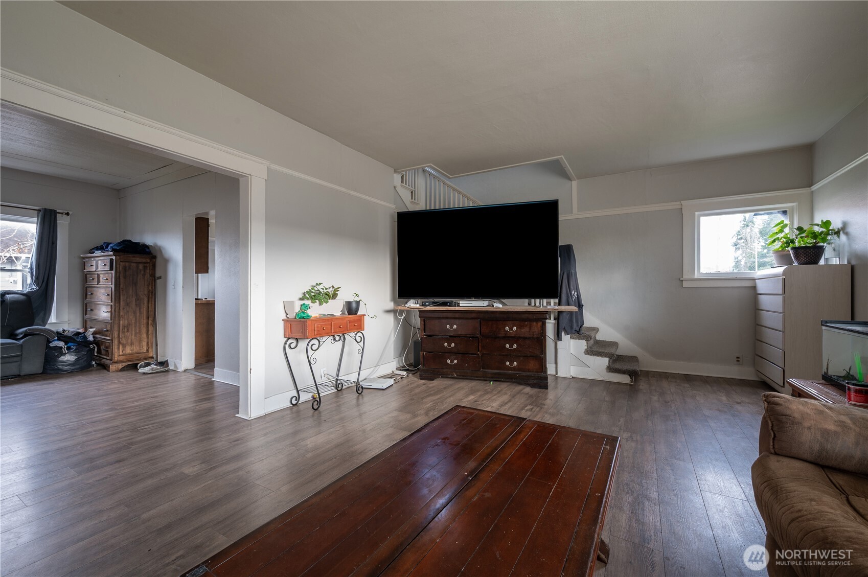 300 West 3rd Street Aberdeen, WA 98520 - Photo 9 of 28 a living room with furniture and a flat screen tv