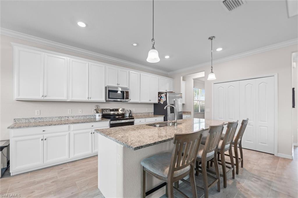 2392 Fallglo Street Naples, FL 34120 - Photo 4 of 47